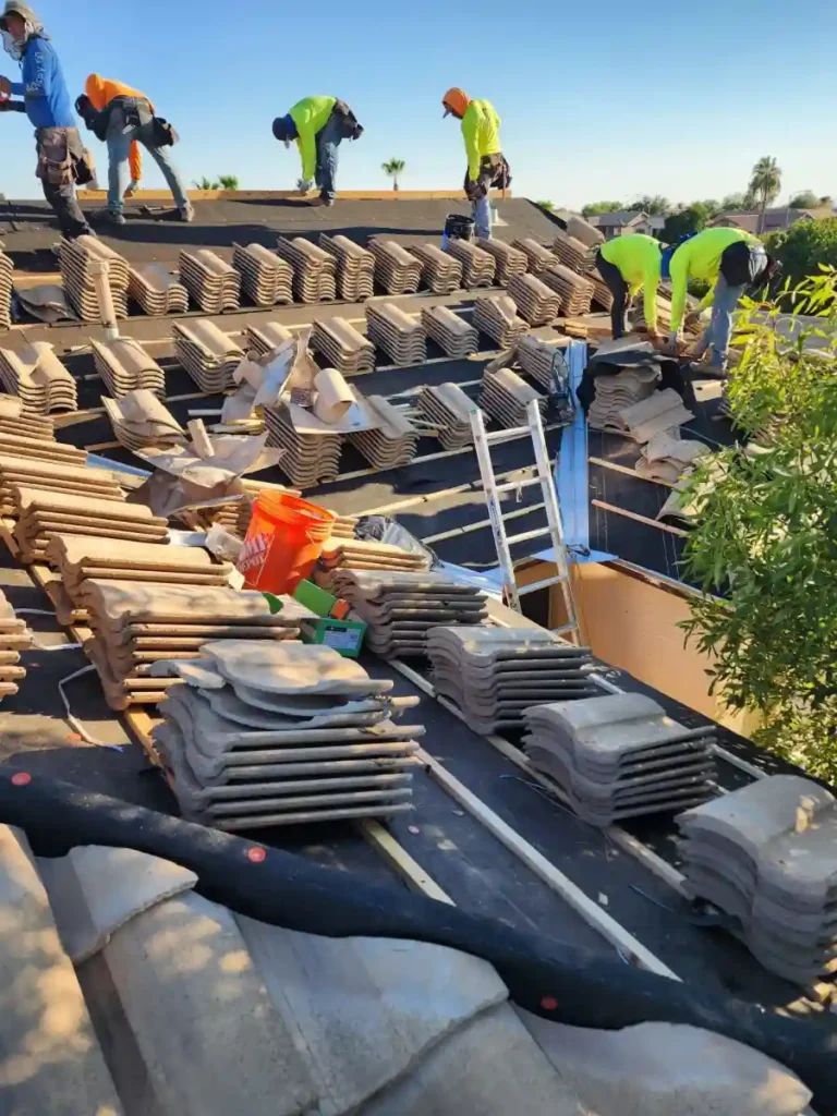 Raise The Roof AZ crew installing a tile roof on an Arizona property