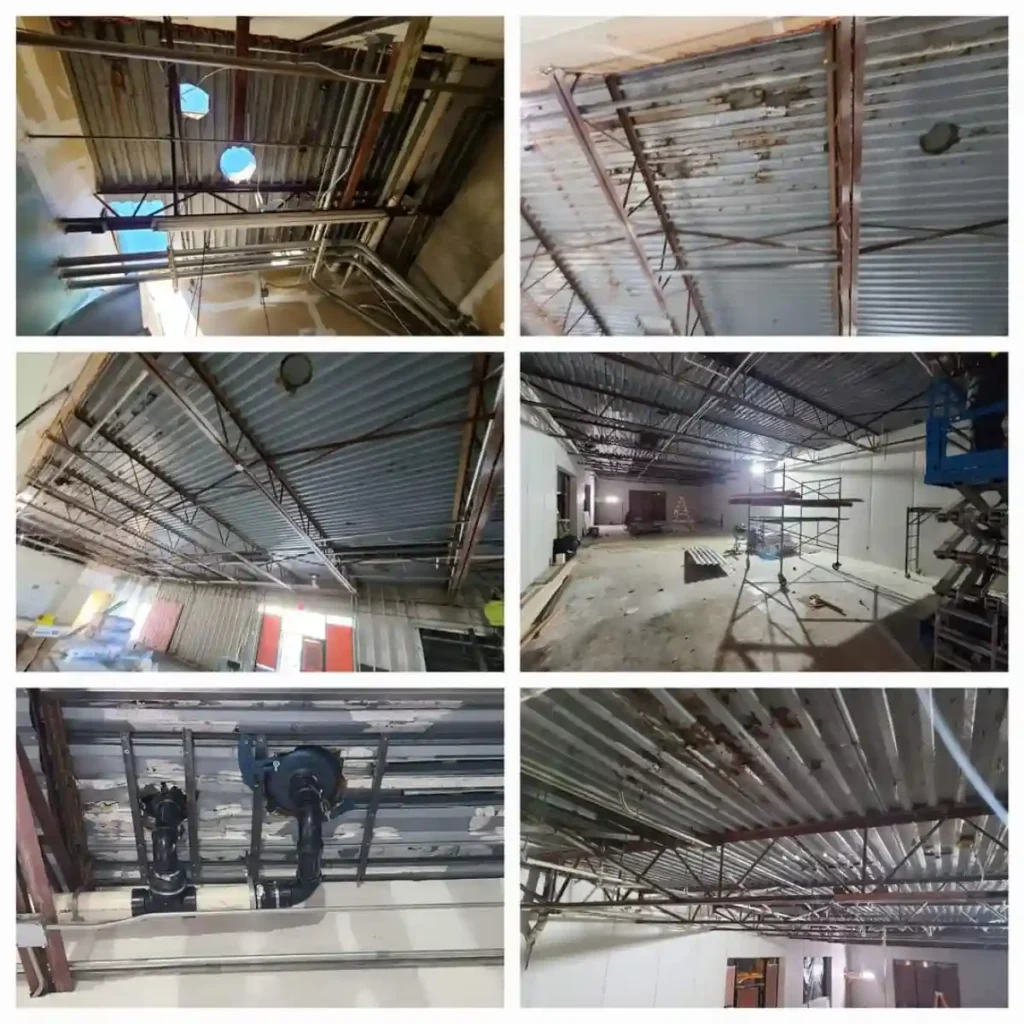 Interior of a commercial building during a roofing and structural project