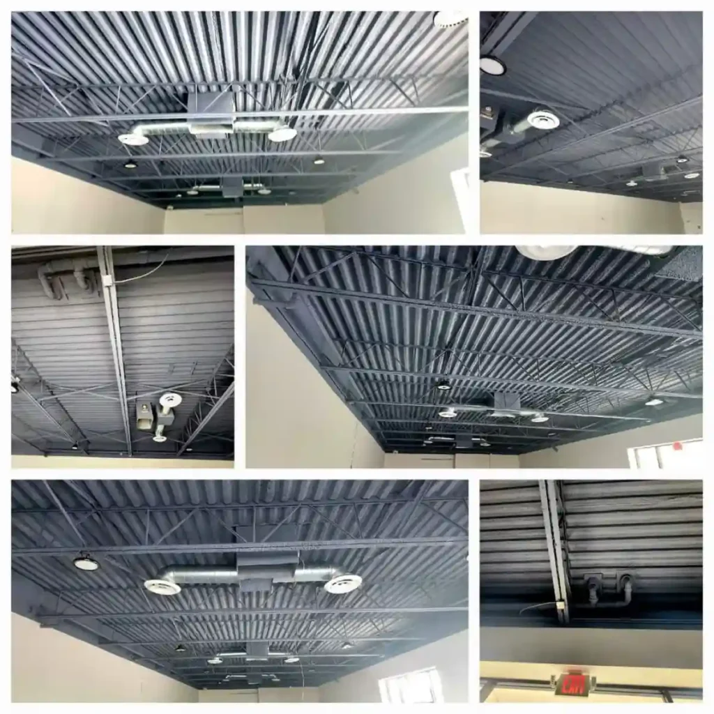 Interior of a commercial building during a roofing and structural project