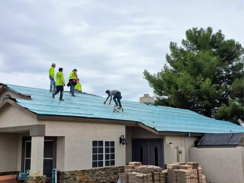 Raise The Roof AZ crew installing a tile roof on an Arizona property