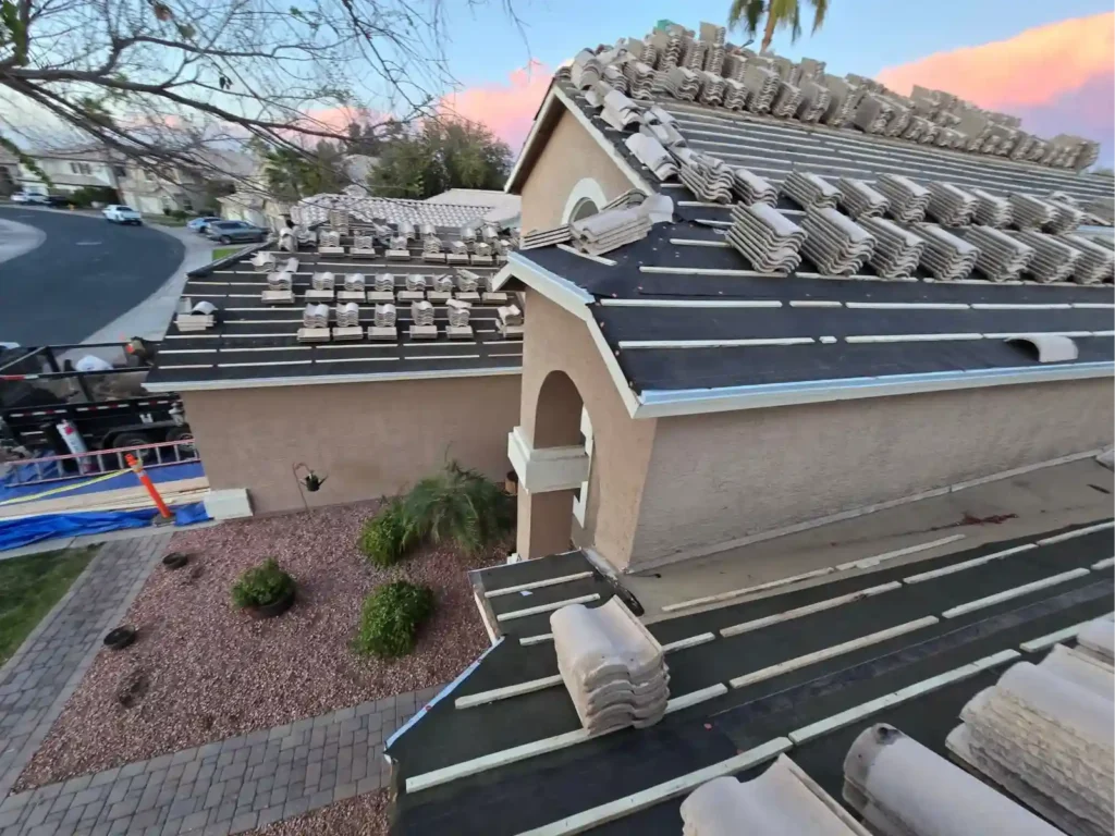Raise The Roof AZ crew installing a tile roof on an Arizona property